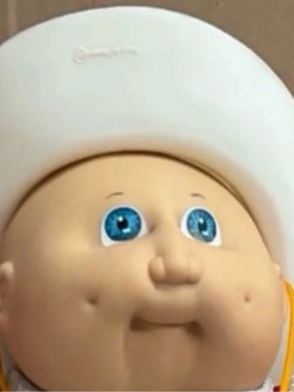 cabbage patch kids wearing a cowboy outfit with cowboy hat